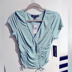 Brand new almost famous Large mint mid length crop top.